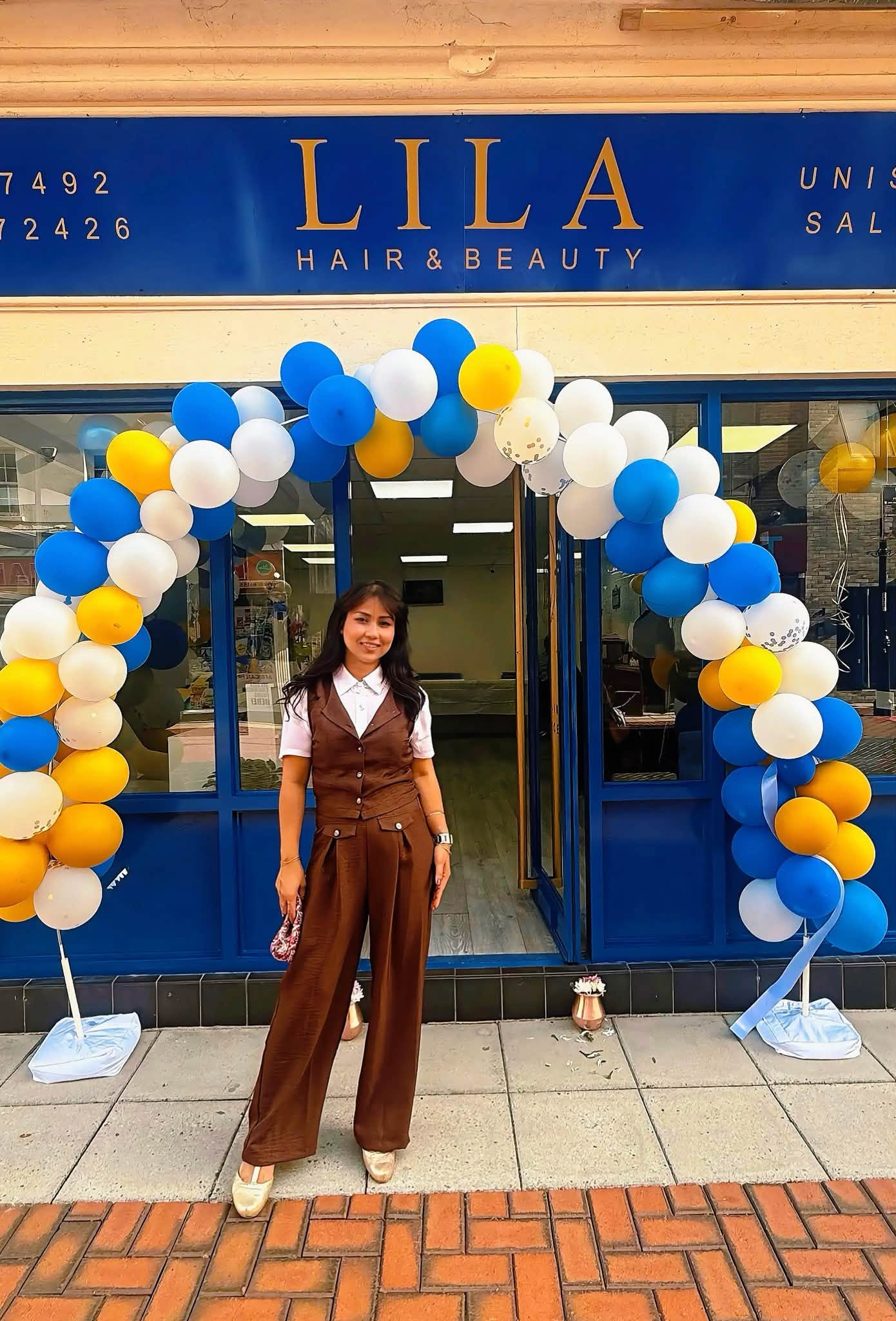 Lila Bishwakarma outside the salon on opening day